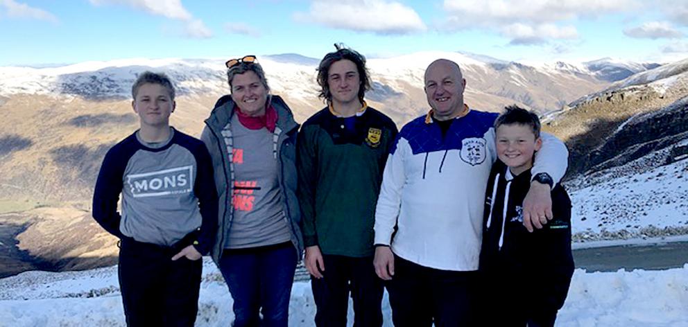 Wayne Jones on the skifield with his wife Joanna and sons Ben, Sam, and Olly. Photo: Supplied