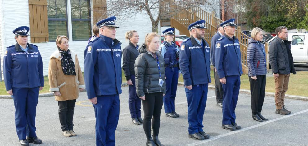 Observing a minute-long silence at 10.37am in Queenstown yesterday were (from left, front)...