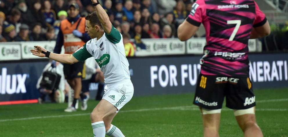 Referee Paul Williams penalises Frizell for moving while on the ground at Forsyth Barr Stadium on...