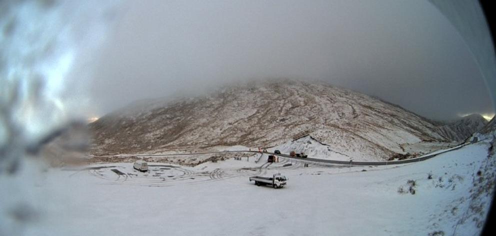 A webcam image showing snow on the Crown Range Rd this morning. Photo: MetService