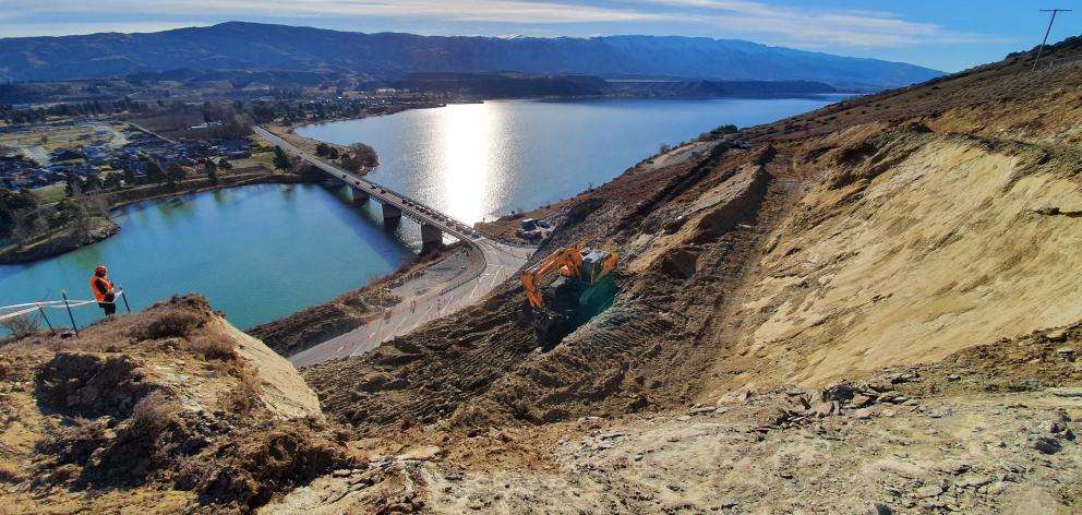 The Deadman’s Point slip over State Highway 8 near Cromwell as ‘‘benching’’ to stabilise it...