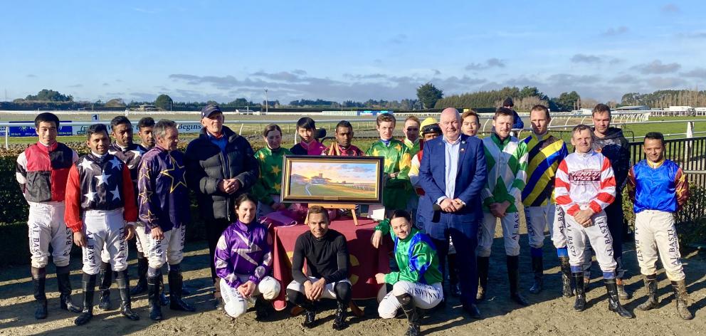 Jockeys and officials joined commentator Dave McDonald for a presentation on his last day of...