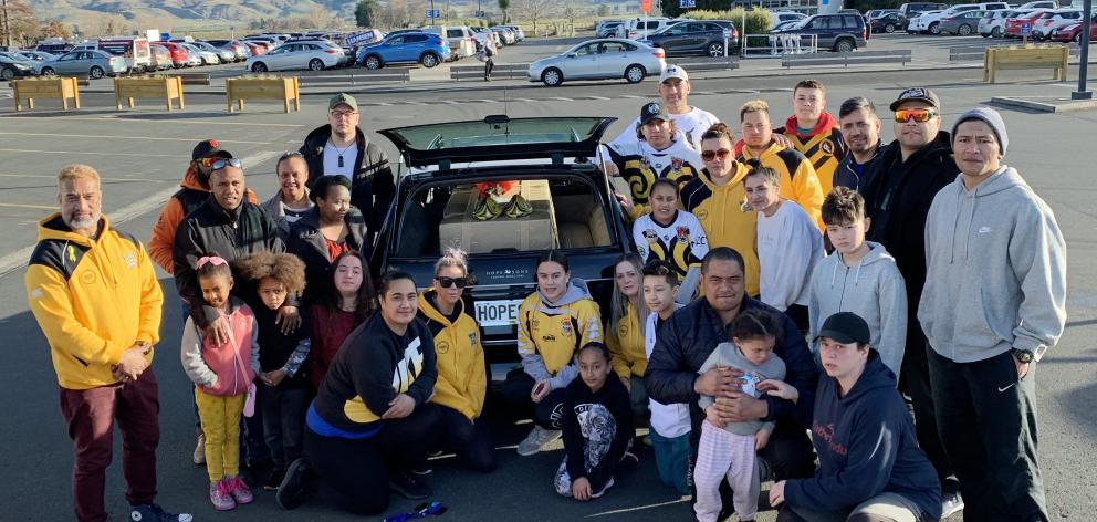 Members of the Kia Toa Tigers Sports Club and community gathered at Dunedin Airport on Sunday to...