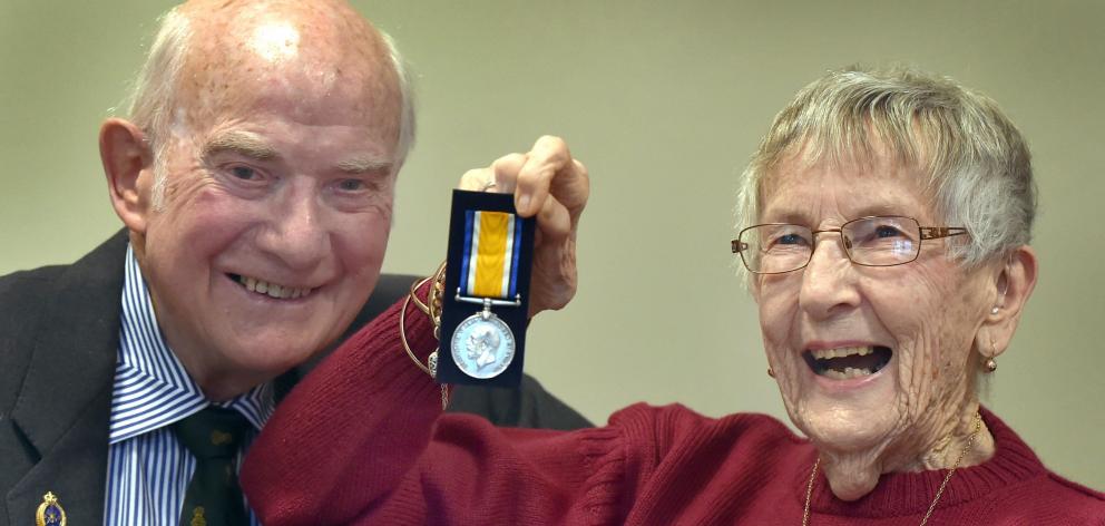 Huia Ockwell presents a British War Medal to Margaret McMaster, whose uncle William Manson served...