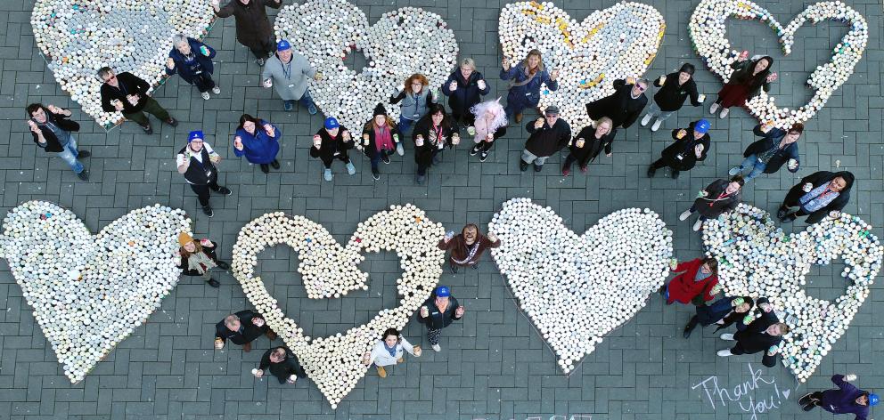 Hearts are filled in a food drive to assist the Presbyterian Support Otago Family Works foodbank....