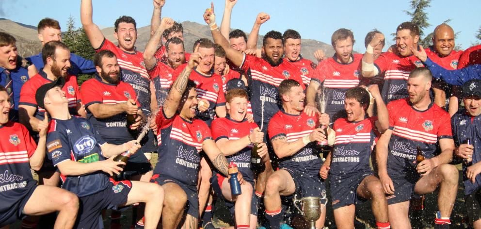 The Cromwell Goats celebrate winning the Central Otago club title at Anderson Park in Cromwell on...