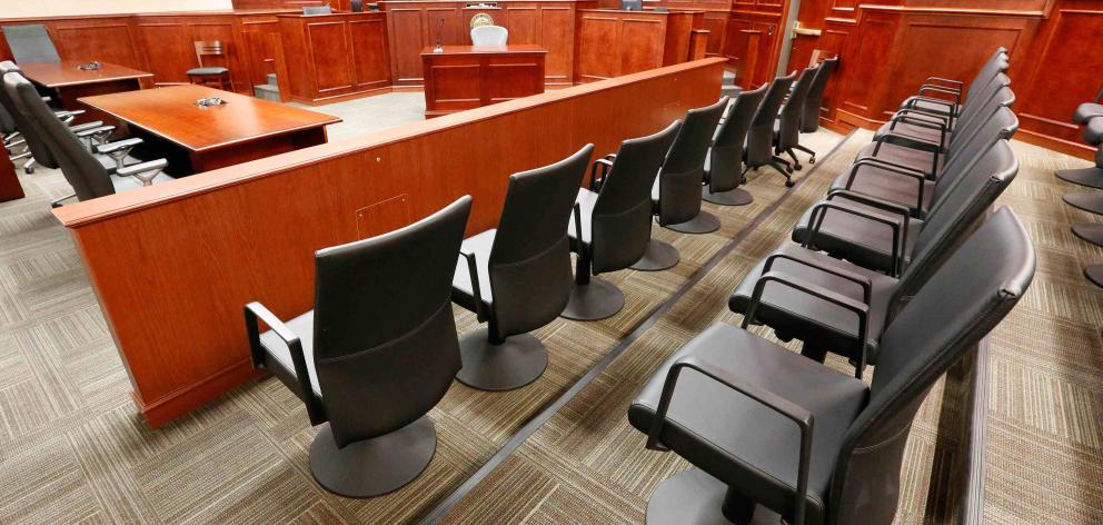 A view of the jury box, right, inside Courtroom 201, where jury selection in the trial of Aurora...