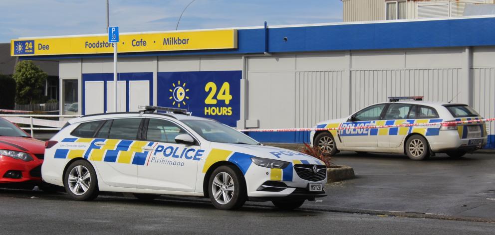 Police cars were parked up at the corner of Hensley and Dee Sts on Friday morning. 