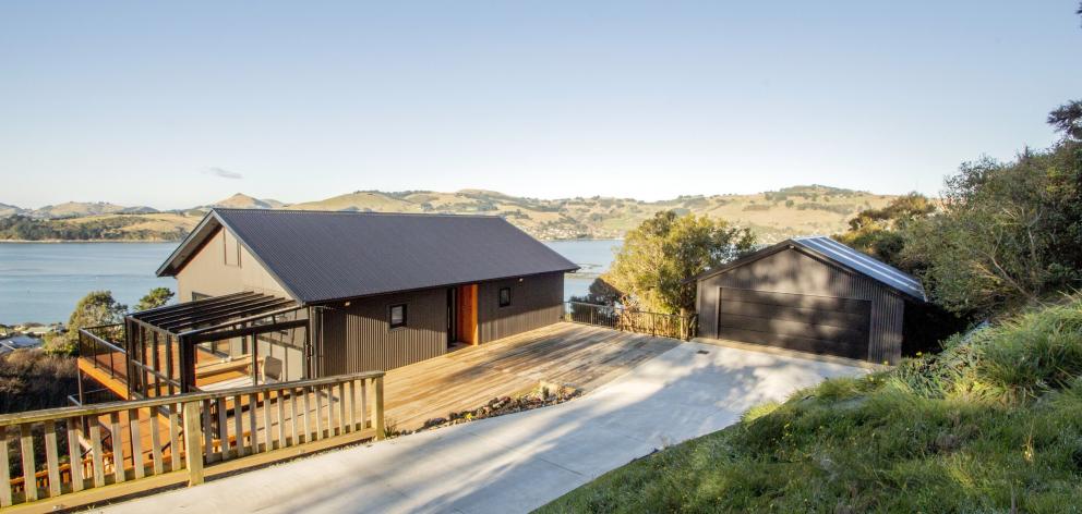 The conservatory, like many in Sweden, is accessed from the deck rather than from the home’s...