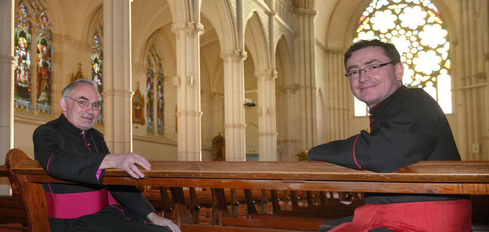 Monsignor John Harrison (left), of the Catholic Diocese of Dunedin, and Dean of Dunedin’s St Paul...