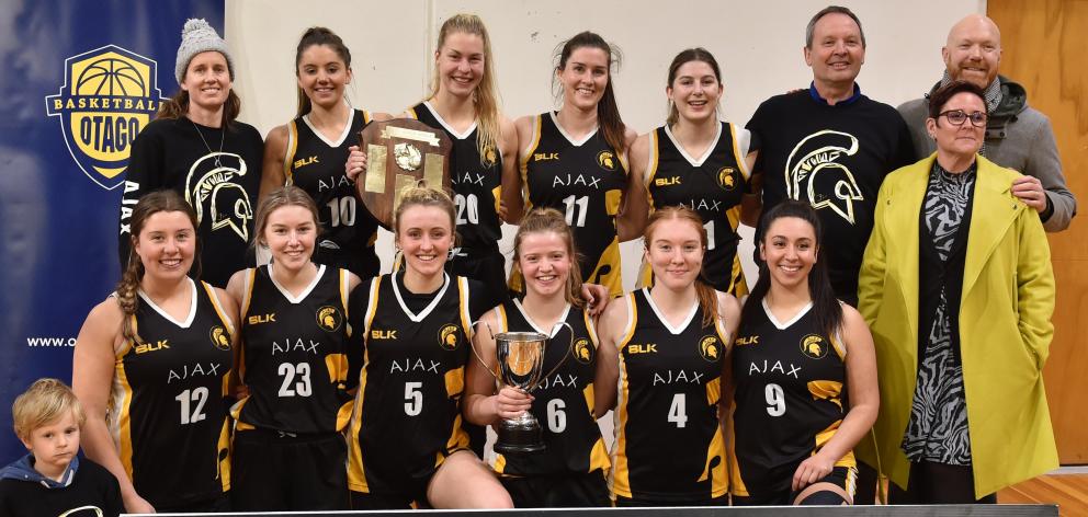 The Ajax players and supporters celebrate after winning the Dunedin women’s club basketball...