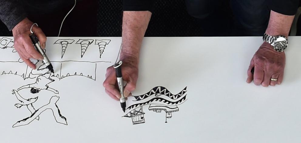 The ‘‘doodle’’ table that the peninsula art group hopes will get people talking. PHOTO: PETER...