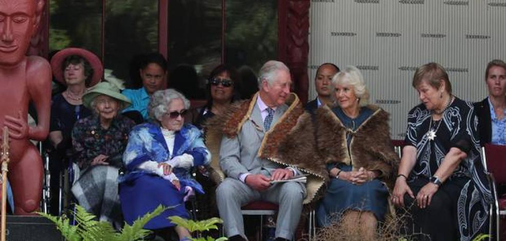 Guest of honour Lady Ellen Elizabeth Reed (in the green hat) sat behind the royal couple when Prince Charles and Lady Camilla were welcomed to Waitangi last year. Photo: John Stone