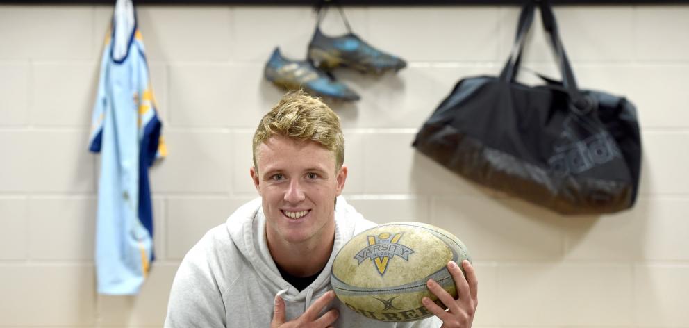 University A captain Jack McHugh in the team’s changing rooms on Tuesday night as he prepares for...
