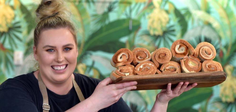 Blend Espresso’s Helena Findlay (24) shows some of the cheese rolls Judith Collins missed out on...
