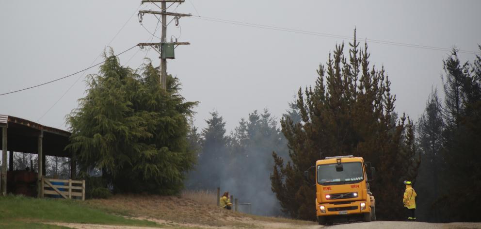 Firefighters at the scene of the blaze. PHOTO: REBECCA RYAN