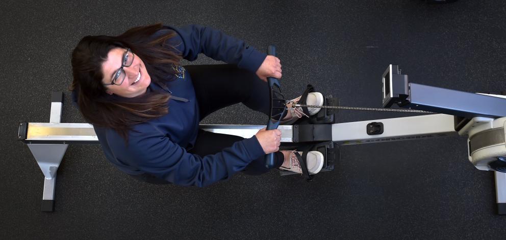 Emma Barker has a go on rowing machine as she takes a break from her new role as the Otago Rowing...
