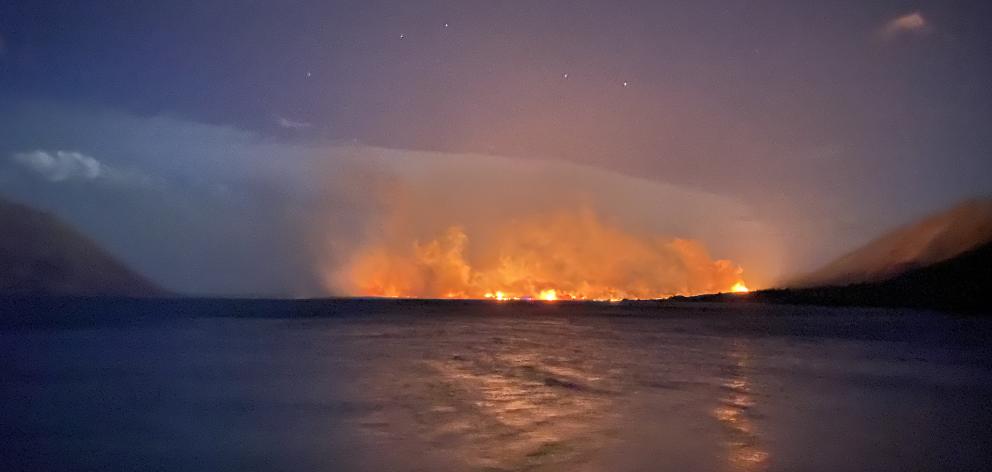 Dunedin man Andy Winneke caught sight of the blaze from where he was camping with his family....