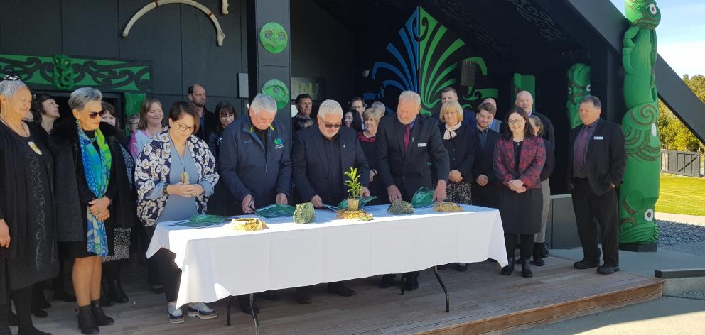 The documents were signed at Arahura Marae yesterday. Photo: Lois Williams