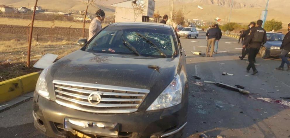 The scene of the attack that killed prominent Iranian scientist Mohsen Fakhrizadeh, outside...