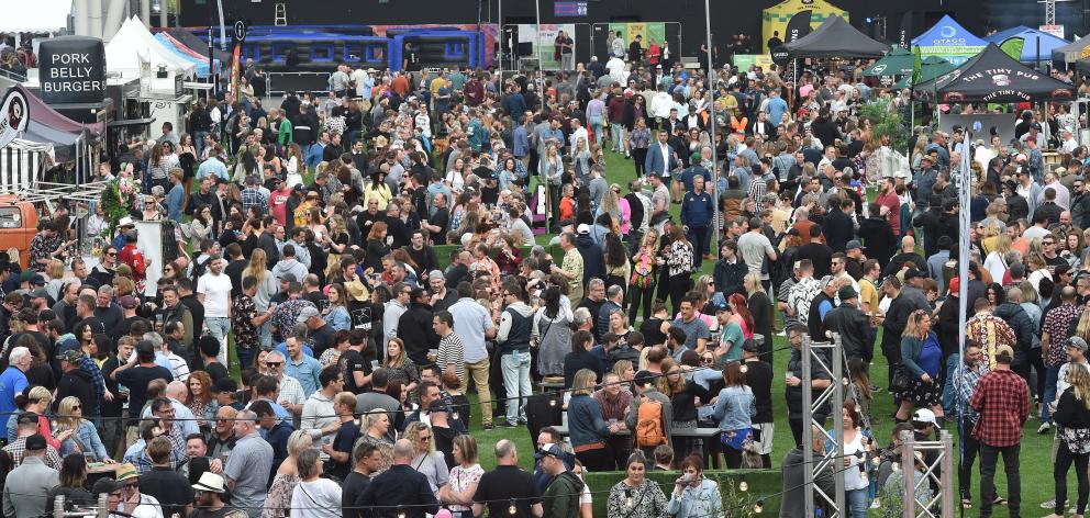 About 6000 people surged through the gates and covered the turf at Forsyth Barr Stadium yesterday...