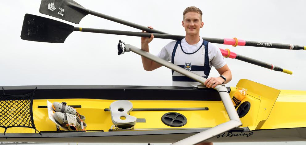Ben Mason with his new sea skiff, which he plans to row around the South Island in January, to...
