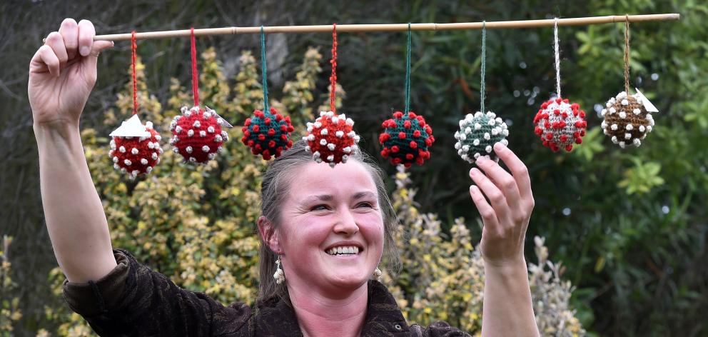 Dunedin artist Emma Hogg has crocheted ‘‘Covid balls’’ made out of wool and cotton. PHOTO: PETER...