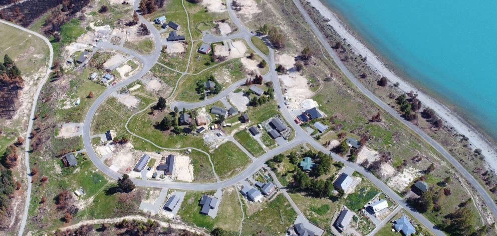 Cleared building sites show where houses were destroyed in the Lake Ohau village fire.
