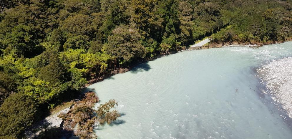 The section of the Lower Hollyford Rd washed out during the February floods. PHOTO: NZTA