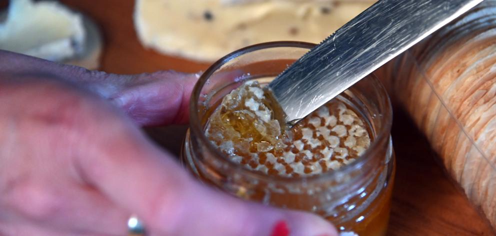 Comb honey in a jar.