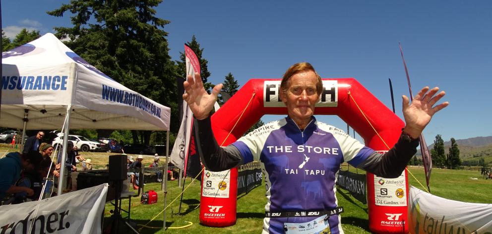 Former 1952 Otago cross-country team runner Ray Bennet completes the duathlon at the Lakes Hayes...