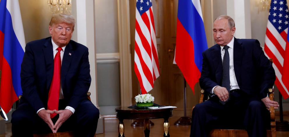 Donald Trump meeting with Russian President Vladimir Putin in Finland in 2018. Photo: Reuters 