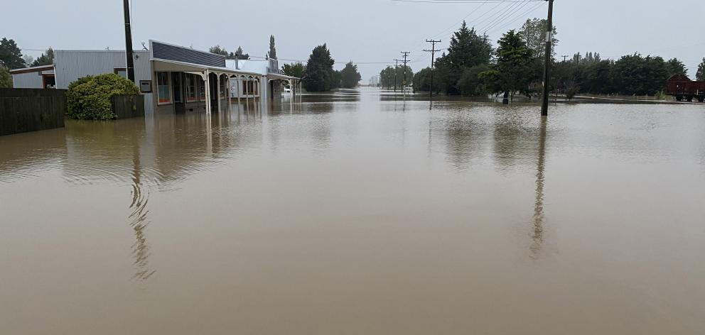 Snow Ave, Middlemarch, with the Tap & Dough Bistro at left, looked more like a river, during...