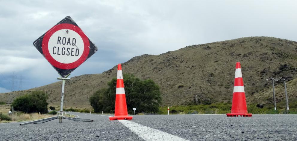 Access to the bridge was closed last week after heavy flooding washed part of it away. PHOTO:...