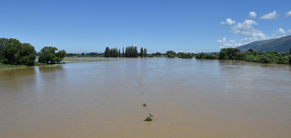 The flooded Taieri River earlier this month as seen from the Outram bridge. Photo: Gregor Richardson