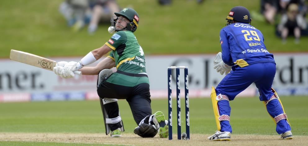 Stags batsman Will Young takes the ball during on the chin against the Volts at the University of...