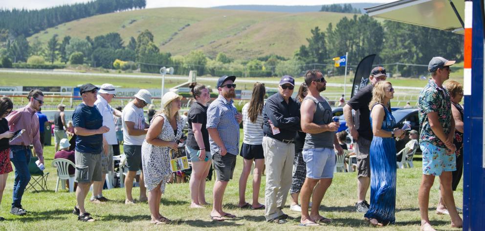 Punters were keen to get some liquid refreshments at Wingatui.