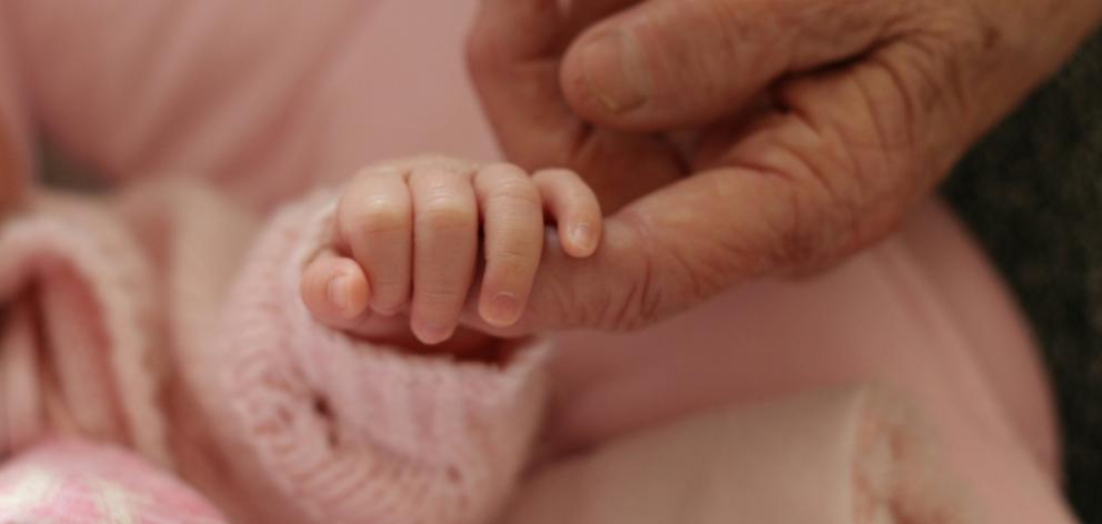 Official government statistics show around 30 women aged in their 50s have delivered children in New Zealand hospitals over the past three years. The previous oldest mum here was 57. Photo: Getty Images