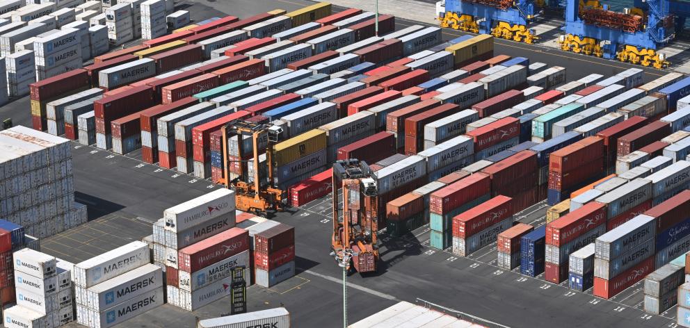 Shipping containers are stacked up at the Port Otago terminal, at Port Chalmers, yesterday. PHOTO...