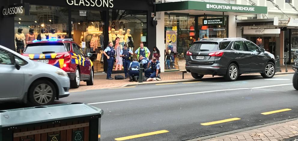 Police arrest a man after an altercation in the CBD today. Photo: Wyatt Ryder