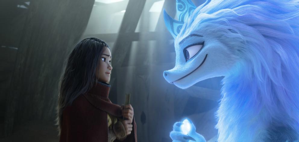 Raya, voiced by Kelly Marie Tran, and Sisu, voiced by Awkwafina, in the movie Raya and the Last...