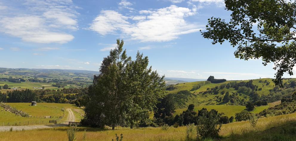 A section of the track follows a metal road rising up away from the plain.