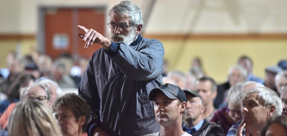 Waikouaiti resident Mick Lewis breaks into Dunedin City Council 3 Waters group manager Tom Dyer’s...