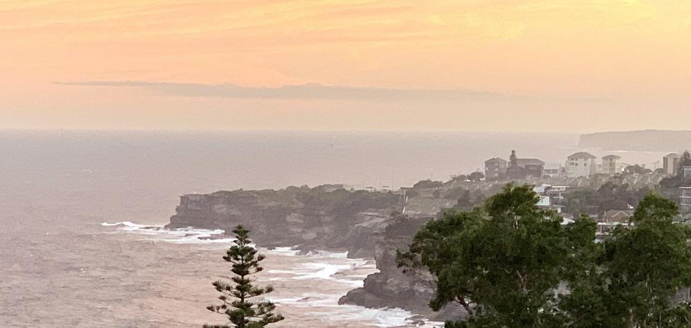 Sunset from the balcony at David and Imy's Love Home Swap apartment near Bondi, Sydney. Photos:...