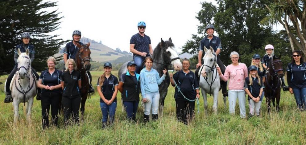 In the saddle ... Waitaki Mayor Gary Kircher (centre on horse) enjoys a day out with the Waitaki...