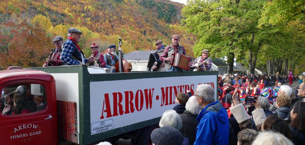 The Arrow Miners Band makes its way down Buckingham St.