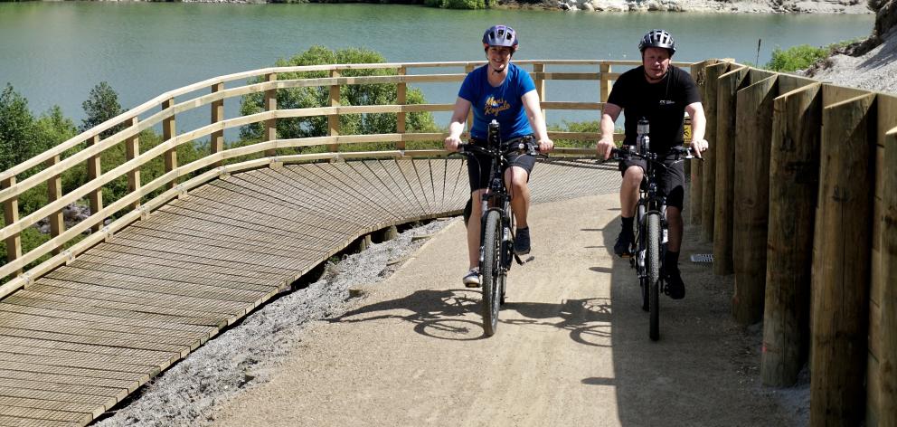 Pip Thomson and Dave Thomson riding on the Lake Dunstan cycle  trail. PHOTO: GRANT BRADLEY
