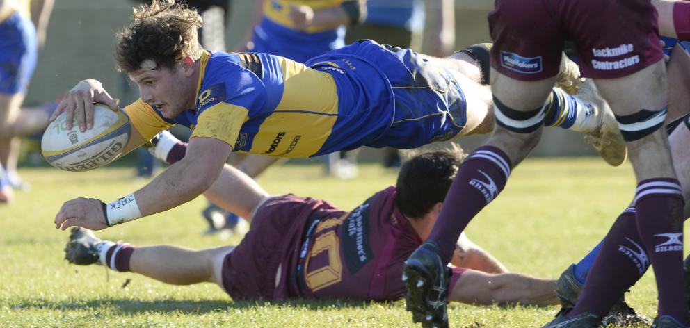 Taieri halfback Bob Martin scores during a premier game against Alhambra-Union at Peter Johnstone...