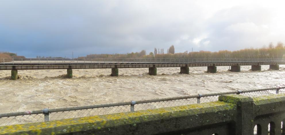 The Ashburton River has dropped a little, but is still a concern. Photo: Ashburton Courier