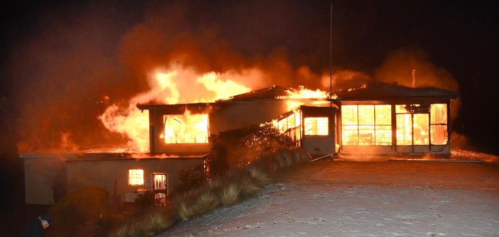 The clubhouse at Belleknowes Golf Club fully ablaze. Photo: Stephen Jaquiery The clubhouse at Belleknowes Golf Club fully ablaze. Photo: Stephen Jaquiery